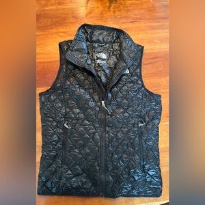 The North Face thermo ball black puffer vest
Women’s medium